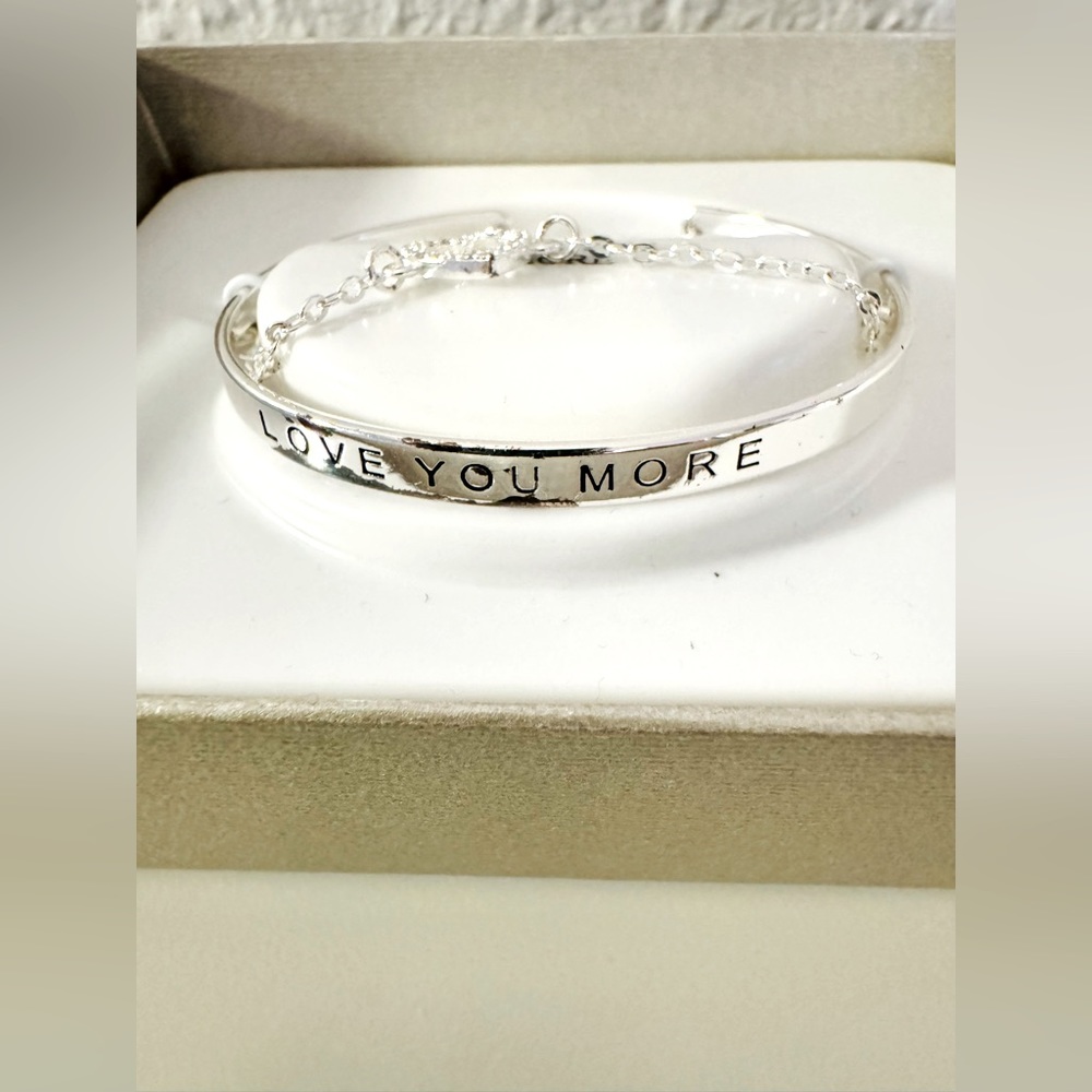 NWT silver plated bracelet w/attached charm, coach charm, & leather purse charm - Picture 4 of 16